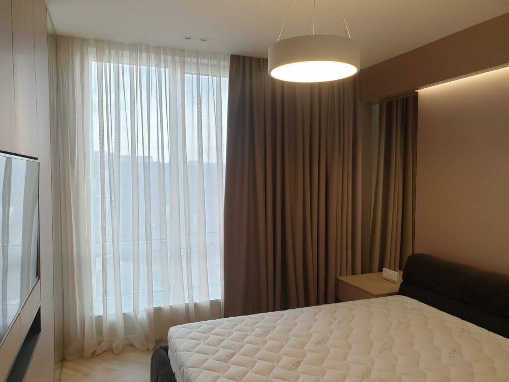 brown curtain in bedroom