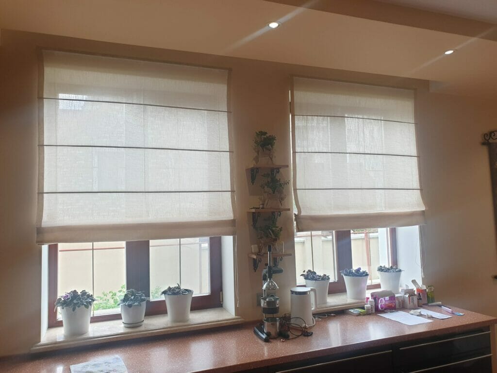 Roman blinds on windows -cute.